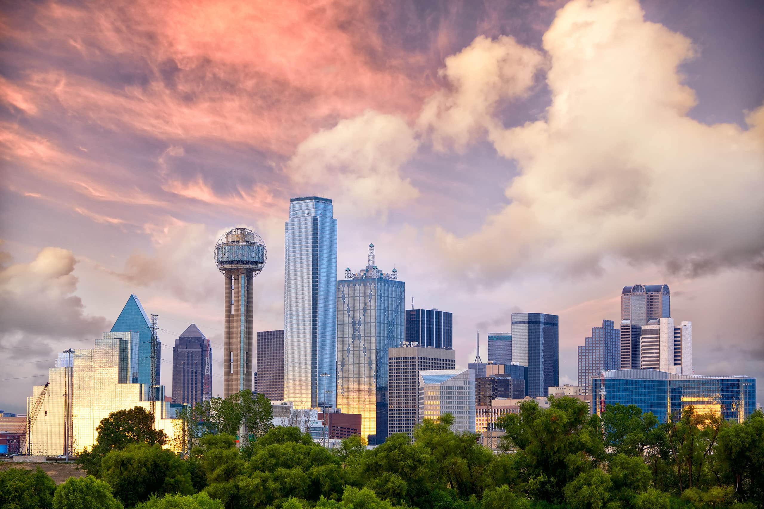 Dallas skyline with Reunion Tower at sunset, one of three cities Trusting Connections serves